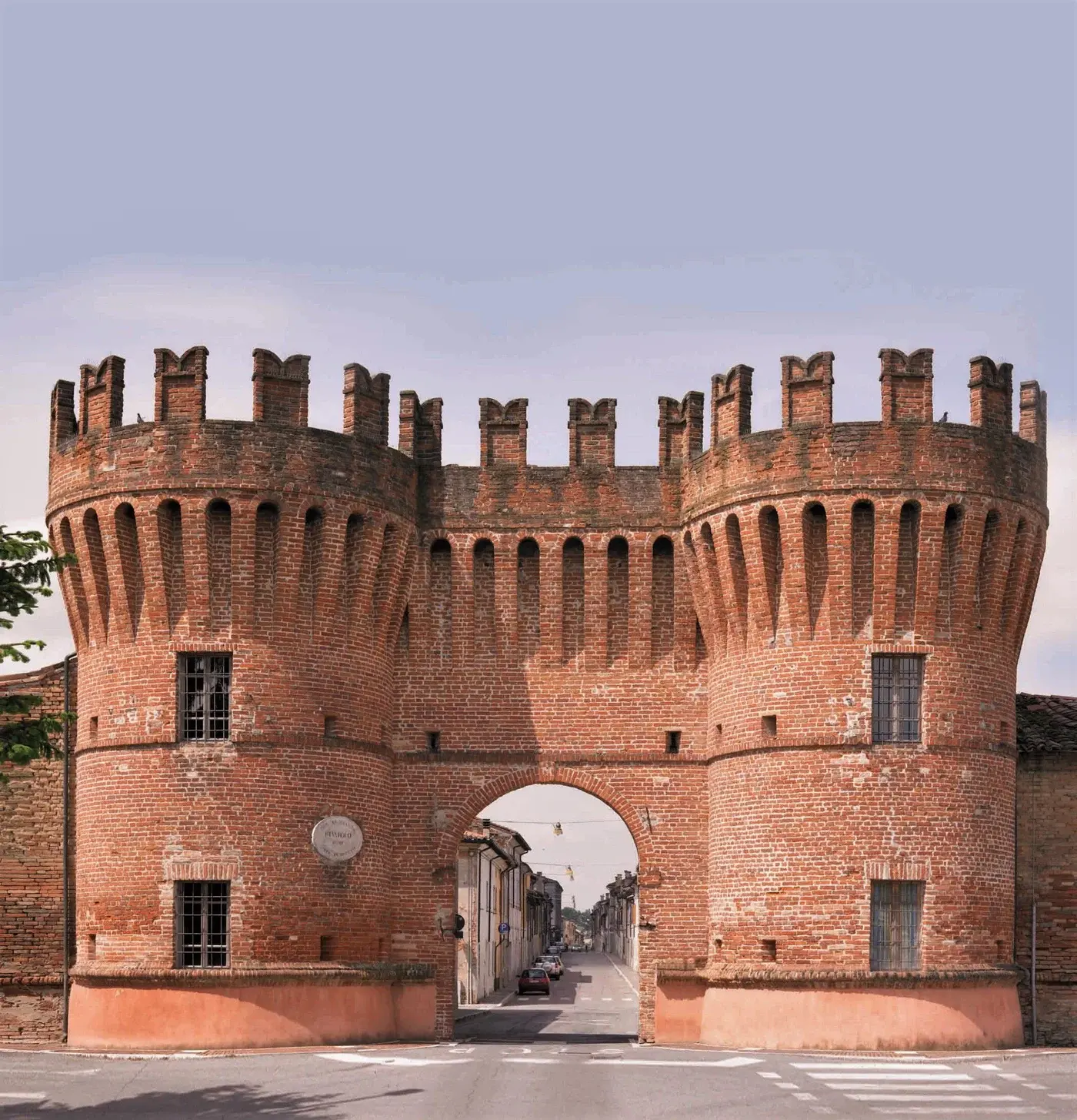 The brick castle gate of Rivarolo Mantovano with its central arch